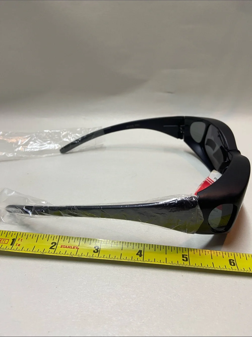 Polarized Black Women's Wrap Sunglasses fits over glasses
